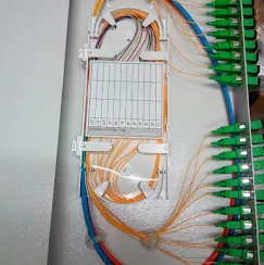 Single-mode fiber splice tray with green APC pigtails prepared by IP Care at Paragon Mall, Abu Dhabi