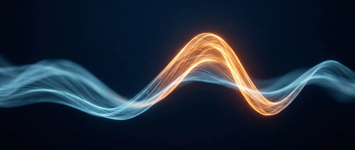 Close-up of a glowing waveform peak in warm orange light